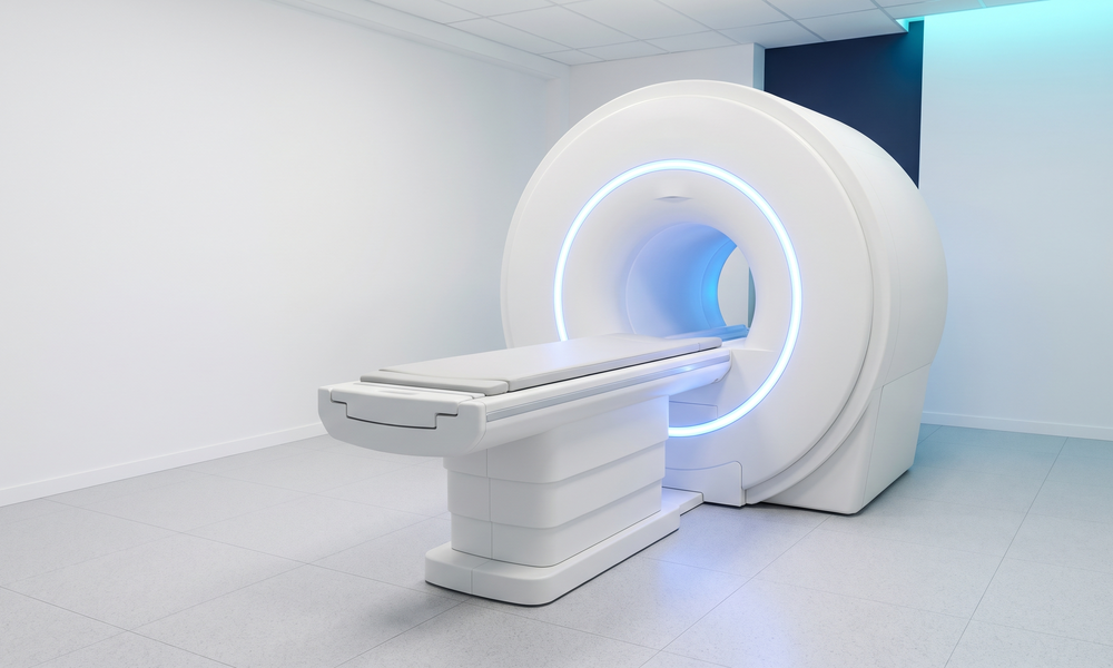 Illustration: a closed-bore MRI scanner and patient table.