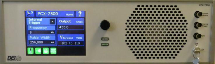 Figure 3. Photo. PCX-7500-EX pulsed current source, front panel, with the trigger, pulse-width and output settings on the touchscreen.