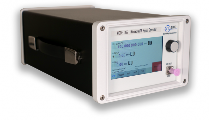 Figure 3. Photo. The Model 865B microwave Signal Generator: 4.21 in high, 6.77 in wide and 11.42 in deep, with the RF output and a touch display on the front panel.